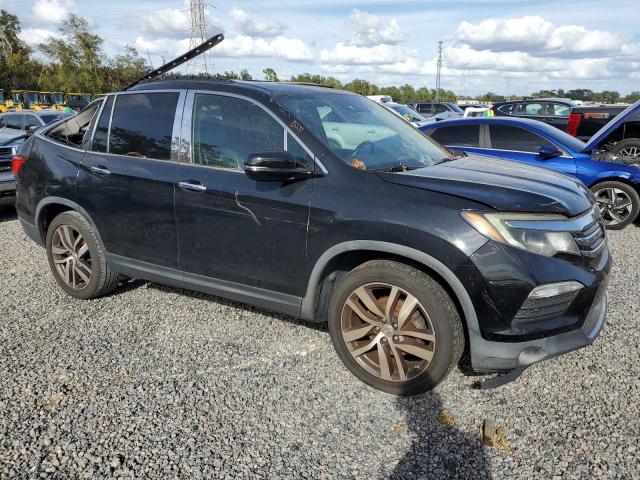 Photo 4 from auction – 2016 HONDA PILOT ELIT with VIN 5FNYF6H08GB034482