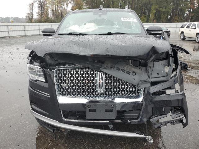 Photo 5 from auction – 2022 LINCOLN NAVIGATOR with VIN 5LMJJ2LT7NEL05114