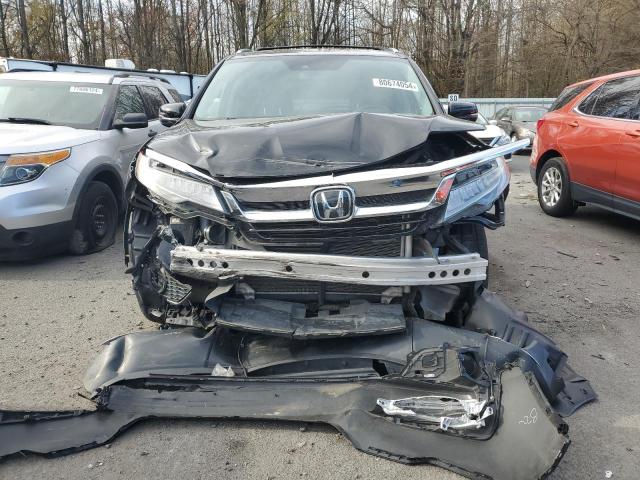 Photo 5 from auction – 2019 HONDA PILOT TOUR with VIN 5FNYF6H93KB034123