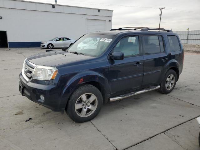 HONDA PILOT 2011 with VIN 5FNYF4H49BB087546 - Photo from auction