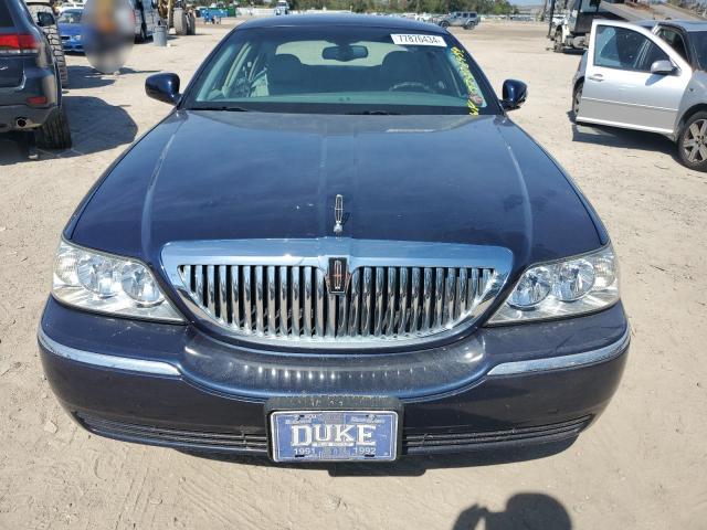 Photo 5 from auction – 2004 LINCOLN TOWN CAR E with VIN 1LNHM81W44Y633015