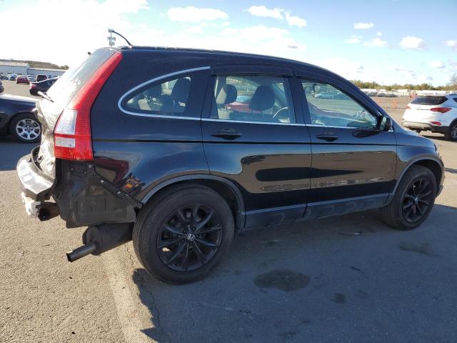 Photo 3 from auction – 2011 HONDA CR-V LX with VIN JHLRE4H30BC012703