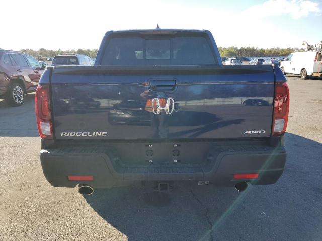 Photo 6 from auction – 2023 HONDA RIDGELINE with VIN 5FPYK3F56PB052883