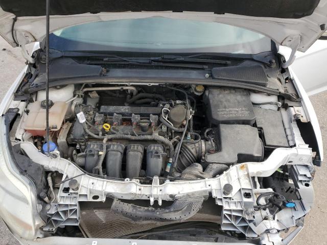 Photo 11 from auction – 2014 FORD FOCUS SE with VIN 1FADP3F26EL218852