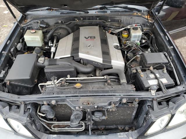 Photo 11 from auction – 2003 LEXUS LX 470 with VIN JTJHT00W333526380