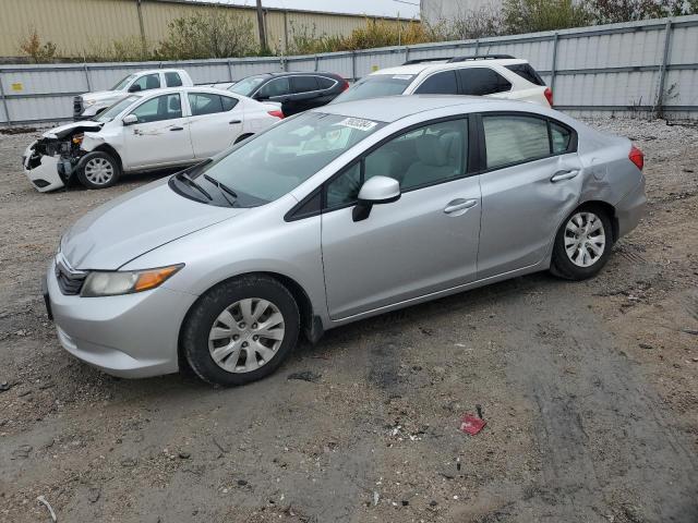 HONDA CIVIC LX 2012 with VIN 19XFB2F57CE091959 - Photo from auction