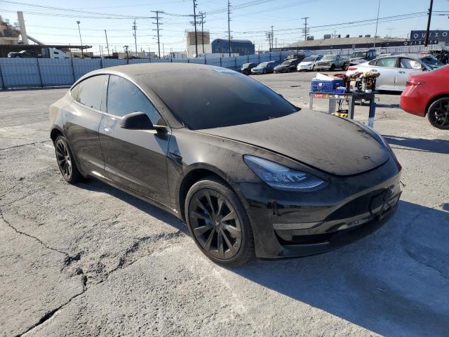 Photo 4 from auction – 2021 TESLA MODEL 3 with VIN 5YJ3E1EA2MF065106