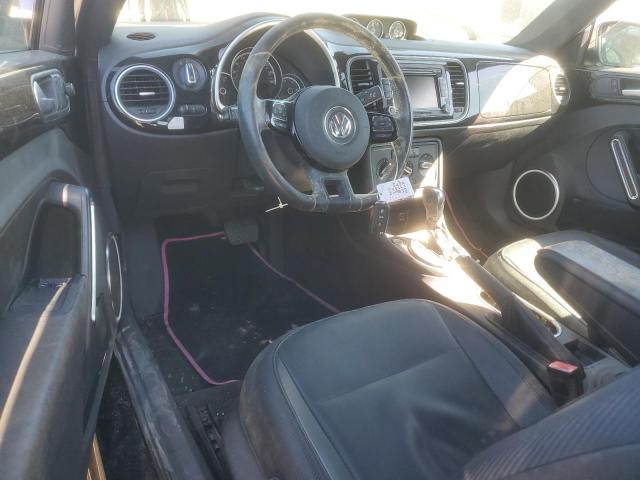 Photo 8 from auction – 2014 VOLKSWAGEN BEETLE with VIN 3VWJL7AT7EM667405
