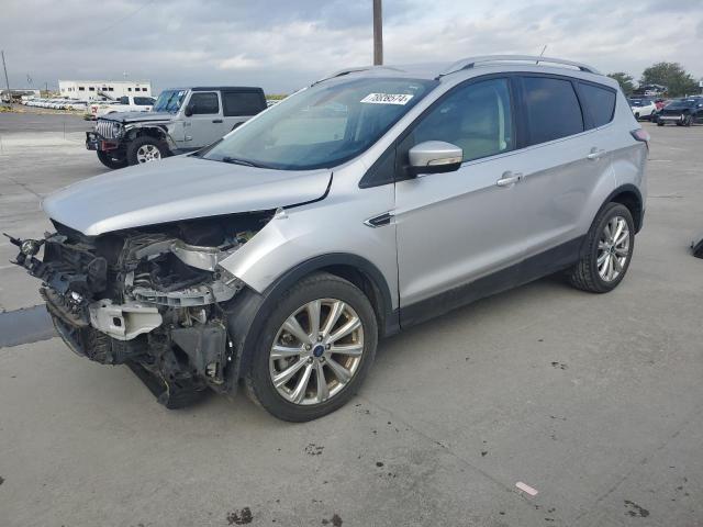 FORD ESCAPE TIT 2017 with VIN 1FMCU0J99HUA64861 - Photo from auction