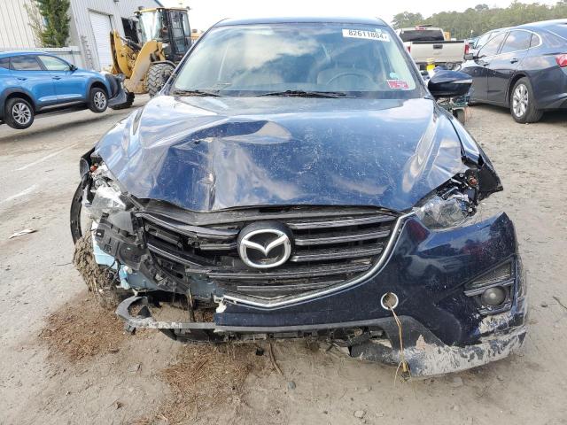 Photo 5 from auction – 2016 MAZDA CX-5 TOURI with VIN JM3KE2CY1G0694092