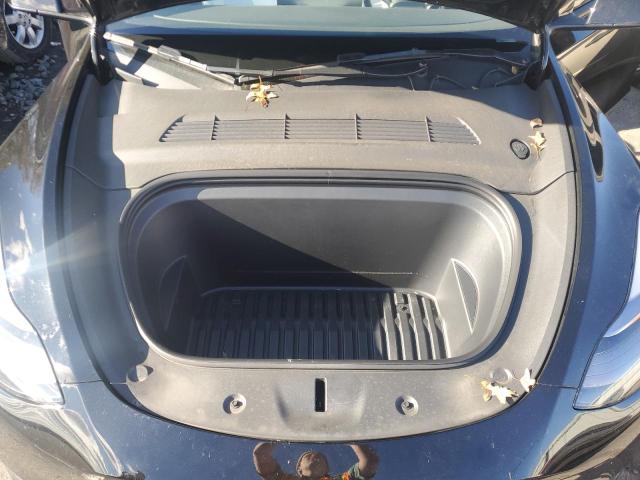 Photo 11 from auction – 2023 TESLA MODEL Y with VIN 7SAYGDEE1PF850759