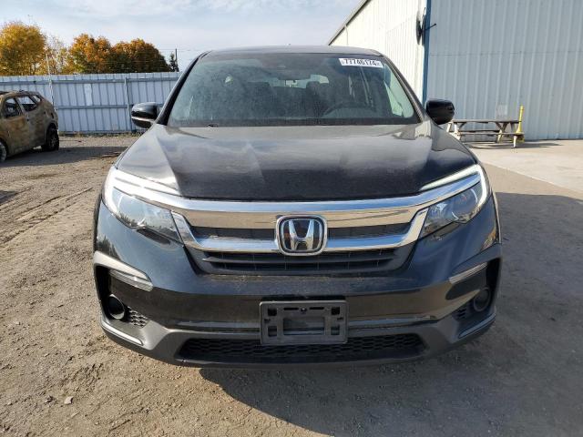 Photo 5 from auction – 2021 HONDA PILOT LX with VIN 5FNYF6H10MB504153