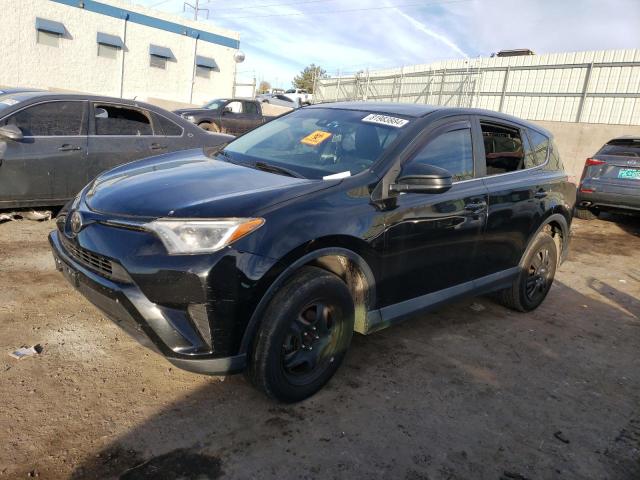 TOYOTA RAV4 LE 2018 with VIN 2T3BFREV4JW713402 - Photo from auction