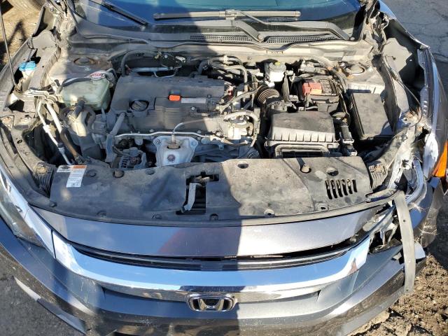 Photo 11 from auction – 2017 HONDA CIVIC LX with VIN 19XFC2F56HE032762
