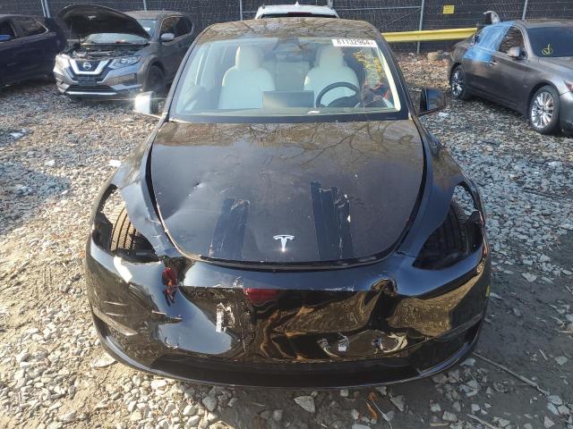 Photo 5 from auction – 2023 TESLA MODEL Y with VIN 7SAYGDEF1PF957416