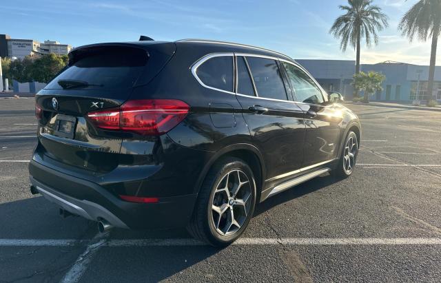 Photo 4 from auction – 2016 BMW X1 XDRIVE2 with VIN WBXHT3C33G5E54263