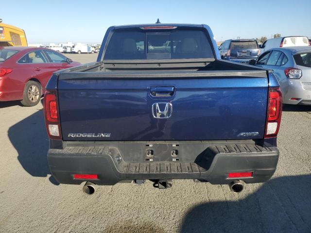 Photo 6 from auction – 2023 HONDA RIDGELINE with VIN 5FPYK3F59PB008747