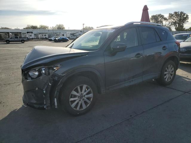 Photo 1 from auction – 2014 MAZDA CX-5 TOURI with VIN JM3KE2CY8E0315196