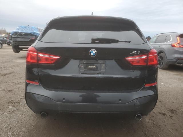 Photo 6 from auction – 2017 BMW X1 XDRIVE2 with VIN WBXHT3C31H5F78873