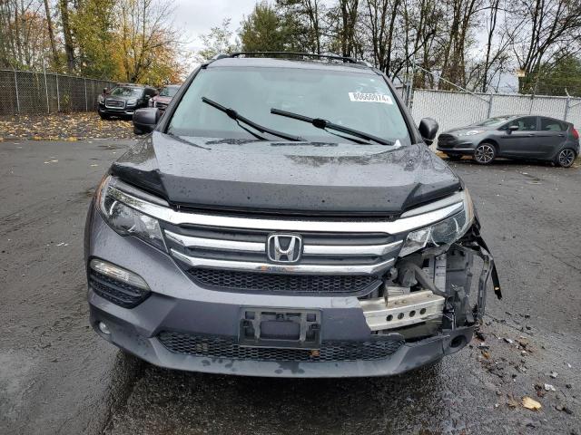 Photo 5 from auction – 2016 HONDA PILOT with VIN 5FNYF6H55GB017019