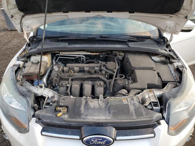 Photo 12 from auction – 2012 FORD FOCUS TITA with VIN 1FAHP3J29CL326338