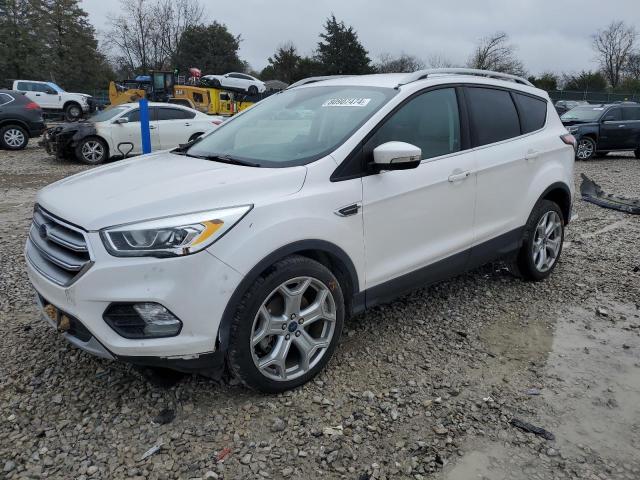 FORD ESCAPE TIT 2017 with VIN 1FMCU0J96HUB49012 - Photo from auction
