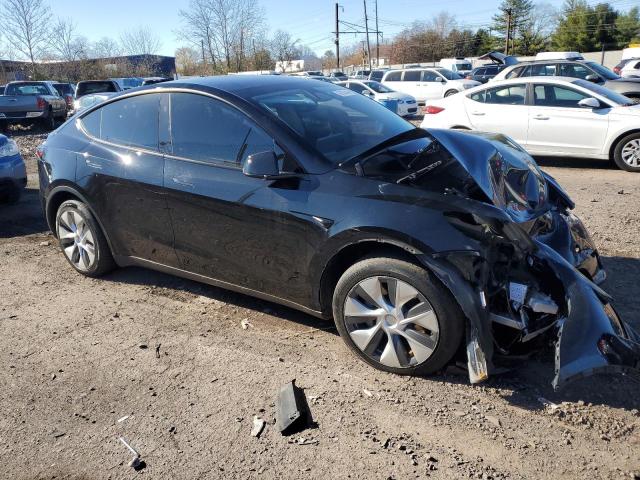 Photo 4 from auction – 2023 TESLA MODEL Y with VIN 7SAYGDEE2PA142744