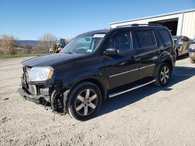 HONDA PILOT TOUR 2012 with VIN 5FNYF4H99CB067617 - Photo from auction