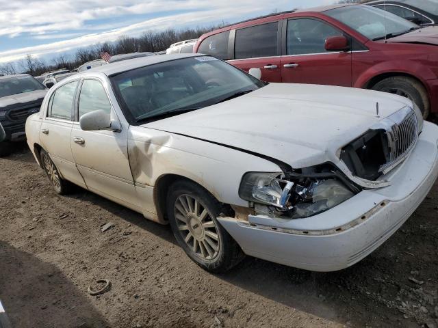 Photo 4 from auction – 2004 LINCOLN TOWN CAR E with VIN 1LNHM81W74Y648110