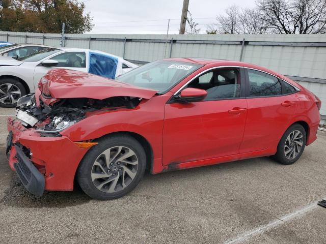 HONDA CIVIC EX 2018 with VIN 2HGFC2F76JH505847 - Photo from auction