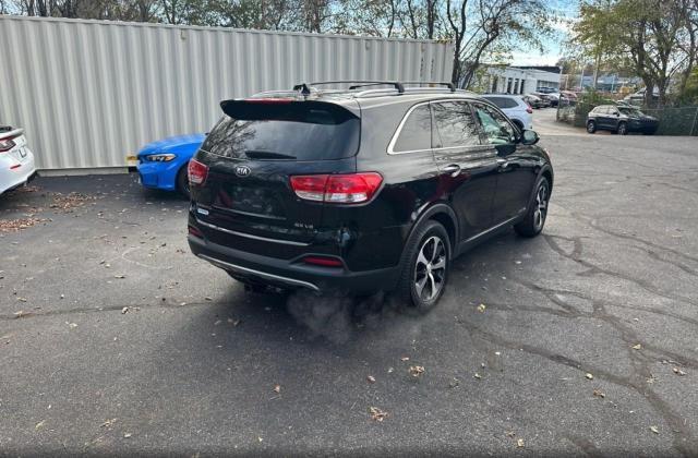 Photo 4 from auction – 2016 KIA SORENTO EX with VIN 5XYPHDA50GG103223