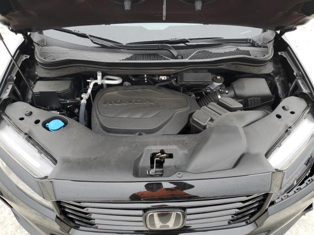 Photo 11 from auction – 2023 HONDA RIDGELINE with VIN 5FPYK3F81PB050419
