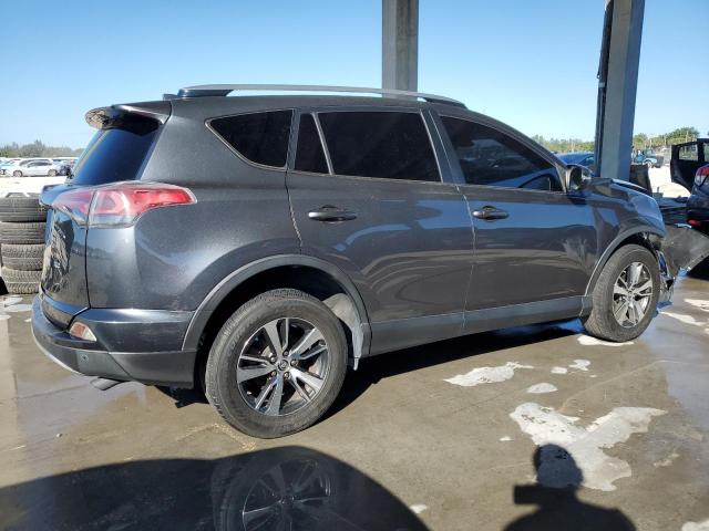 Photo 3 from auction – 2017 TOYOTA RAV4 XLE with VIN JTMWFREVXHD098458
