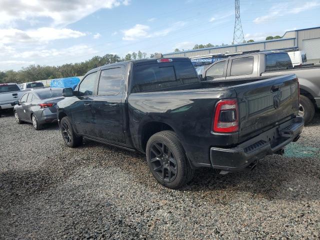 Photo 2 from auction – 2023 RAM 1500 LARAM with VIN 1C6SRFJM8PN503105