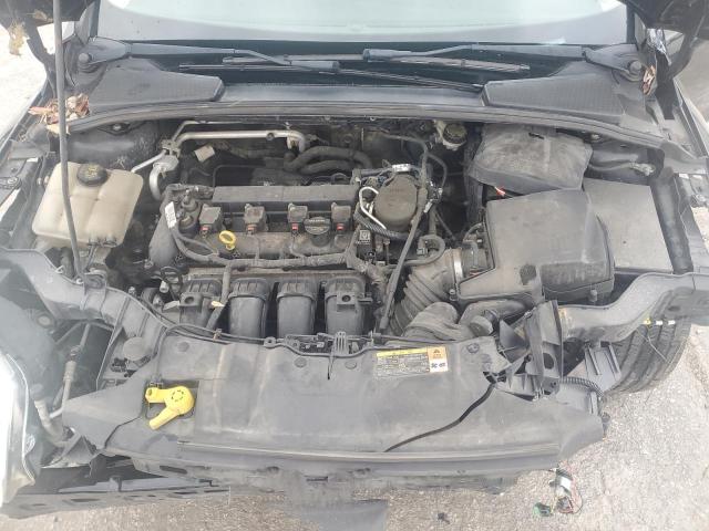 Photo 11 from auction – 2014 FORD FOCUS SE with VIN 1FADP3K25EL129117