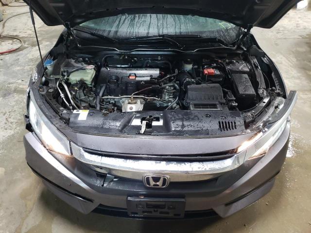 Photo 11 from auction – 2018 HONDA CIVIC LX with VIN 19XFC2F50JE033119