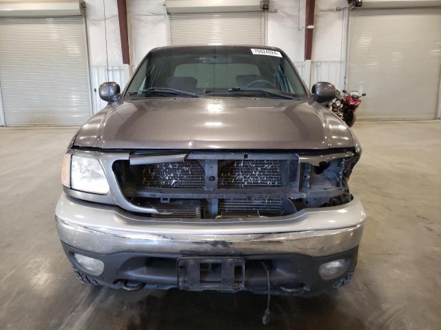 Photo 5 from auction – 2003 FORD F150 SUPER with VIN 1FTRW08L73KB96614