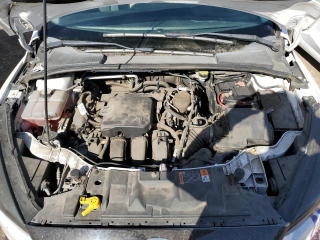 Photo 11 from auction – 2015 FORD FOCUS SE with VIN 1FADP3F29FL300530