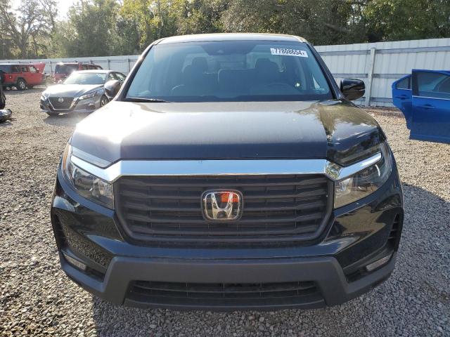 Photo 5 from auction – 2023 HONDA RIDGELINE with VIN 5FPYK3F56PB034013