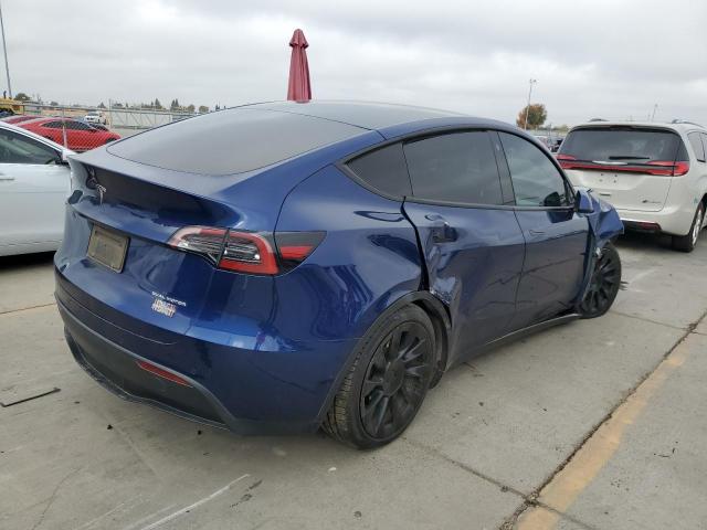Снимка 3 от търг – 2022 TESLA MODEL Y с VIN 7SAYGAEE1NF349947