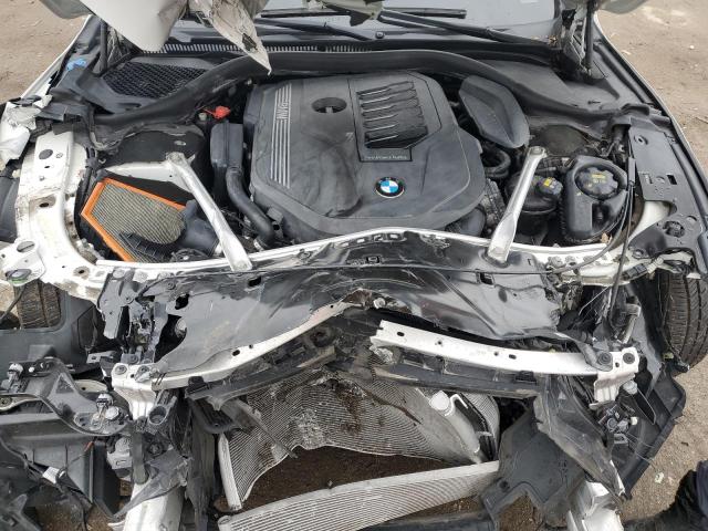 Photo 11 from auction – 2022 BMW 840XI with VIN WBAGV4C01NCJ30083