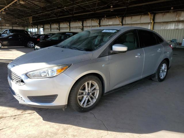 FORD FOCUS SE 2018 with VIN 1FADP3FE0JL304209 - Photo from auction