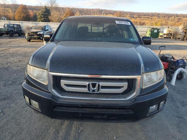 Photo 5 from auction – 2010 HONDA RIDGELINE with VIN 5FPYK1F50AB010737