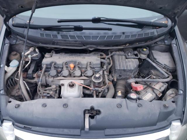 Photo 11 from auction – 2010 HONDA CIVIC DX with VIN 2HGFA1F2XAH036394