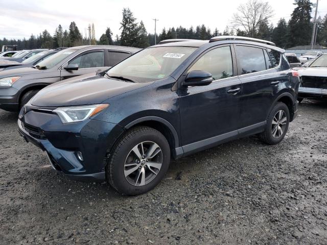 TOYOTA RAV4 XLE 2017 with VIN JTMRFREV0HJ708883 - Photo from auction