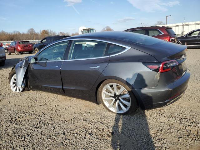 Photo 2 from auction – 2018 TESLA MODEL 3 with VIN 5YJ3E1EB7JF087106