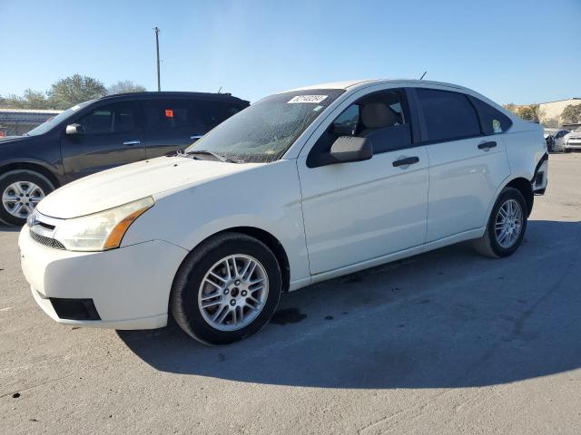 FORD FOCUS SE 2010 with VIN 1FAHP3FN2AW154104 - Photo from auction