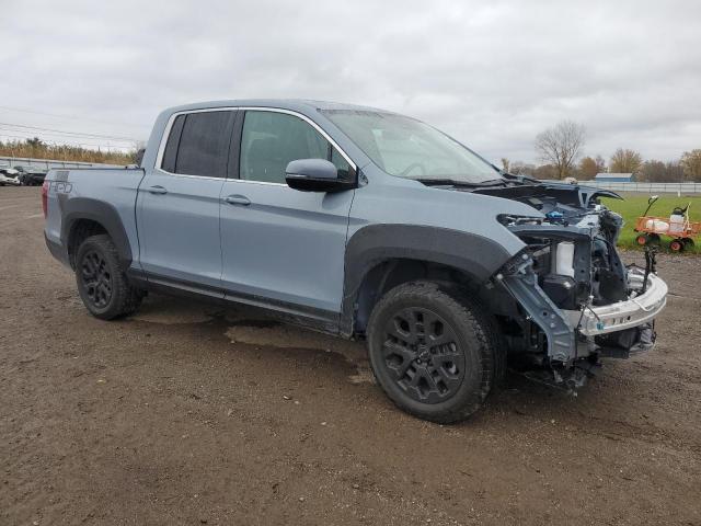 Photo 4 from auction – 2023 HONDA RIDGELINE with VIN 5FPYK3F59PB065336