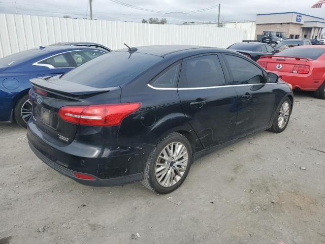 Photo 3 from auction – 2016 FORD FOCUS TITA with VIN 1FADP3J28GL224033
