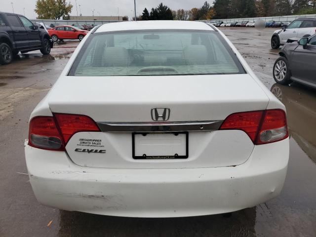 Photo 6 from auction – 2011 HONDA CIVIC LX with VIN 19XFA1F50BE046194